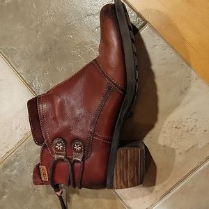 Pikolinos red booties. Used but well made.  Cute design and details!